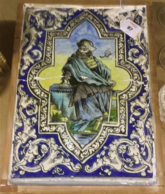 A large Persian polychrome pottery tile, Qajar dynasty, 44.5 x 32.5cm, repairs